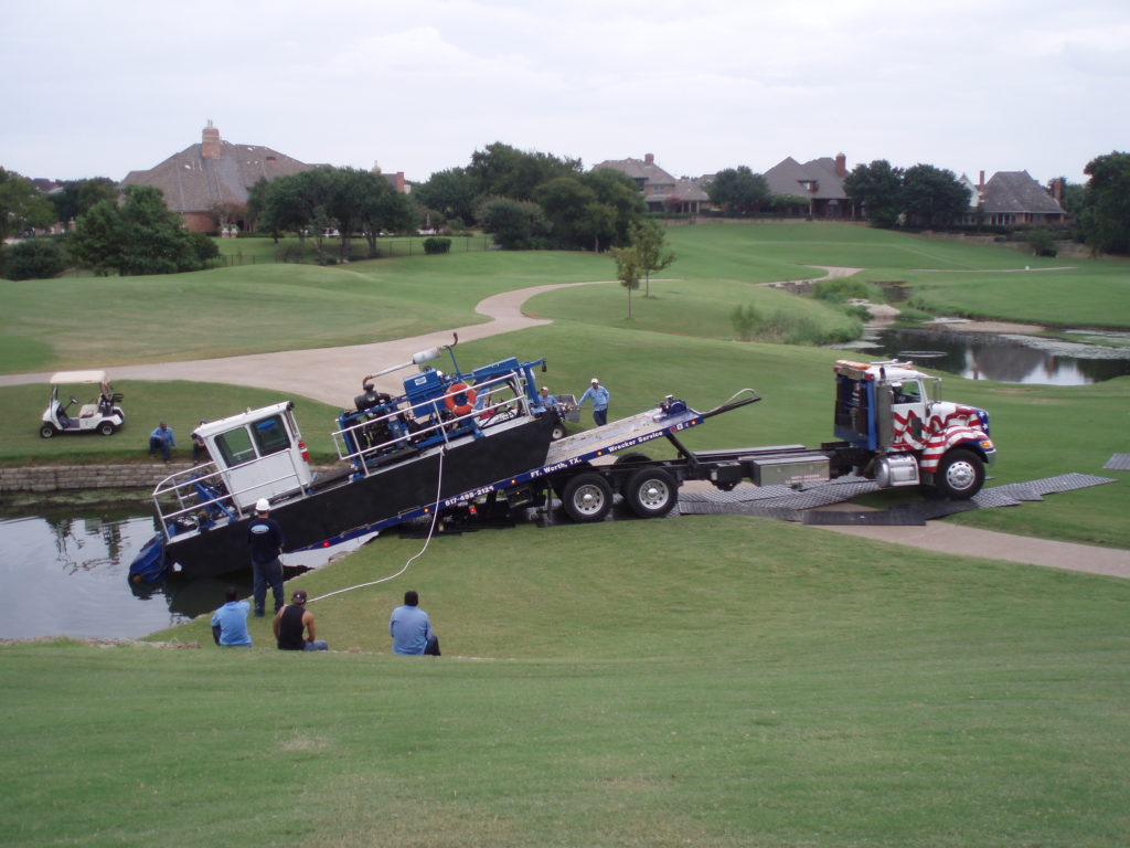 Launching a dredge at a golf course